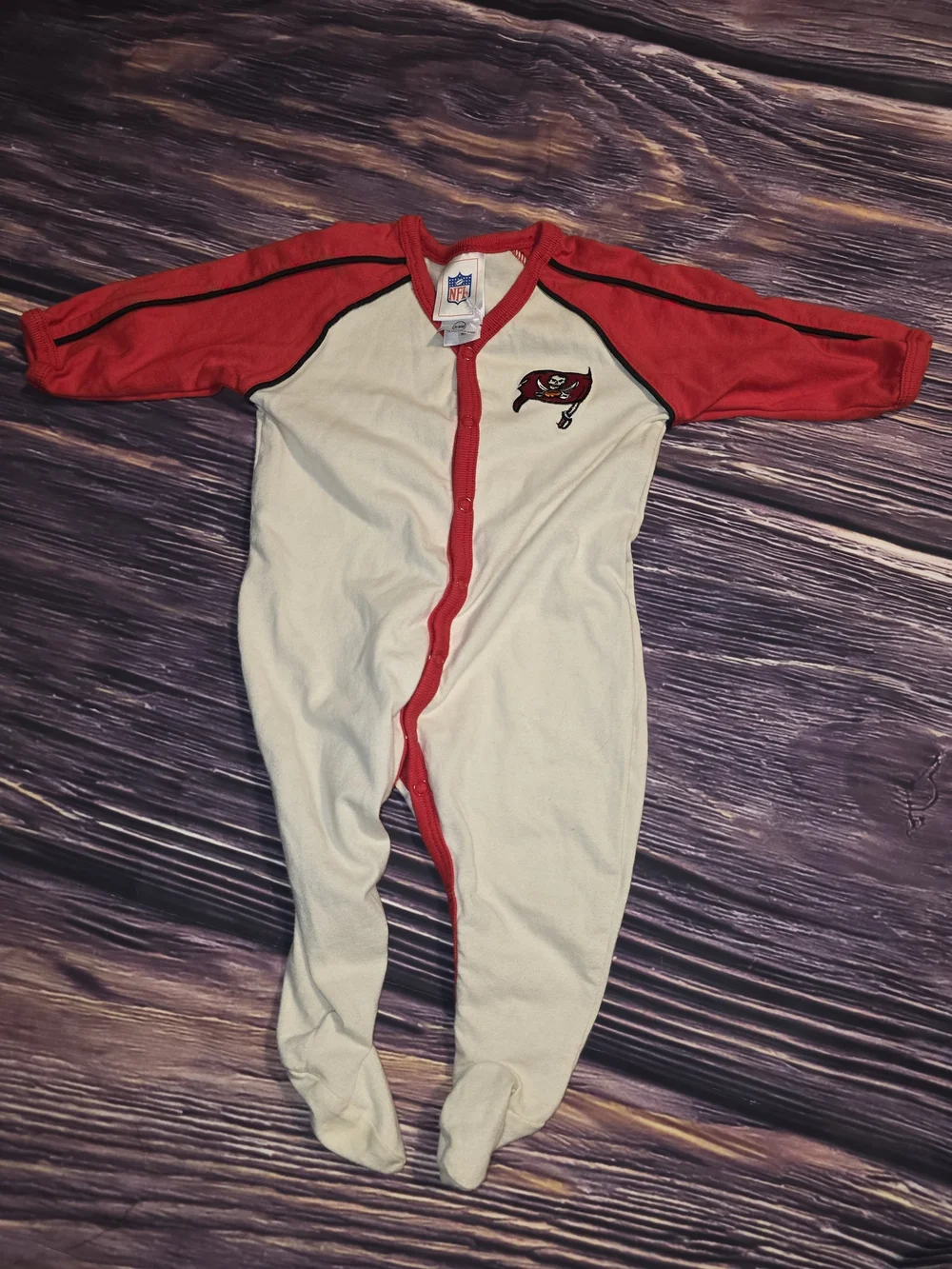 NFL Baby Footed One-Piece in White and Red with Buccaneers Logo